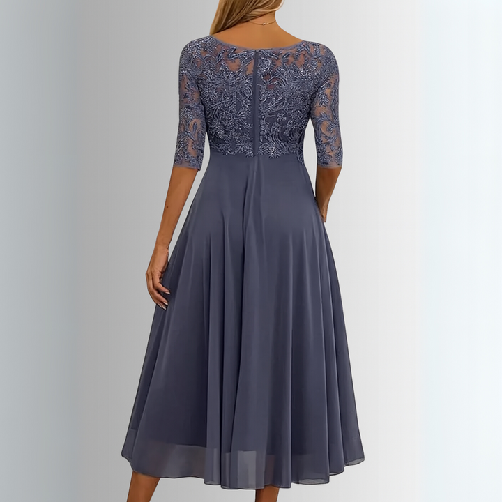 Elegant women's floral lace midi dress, an ideal and stylish choice for a wedding guest outfit.