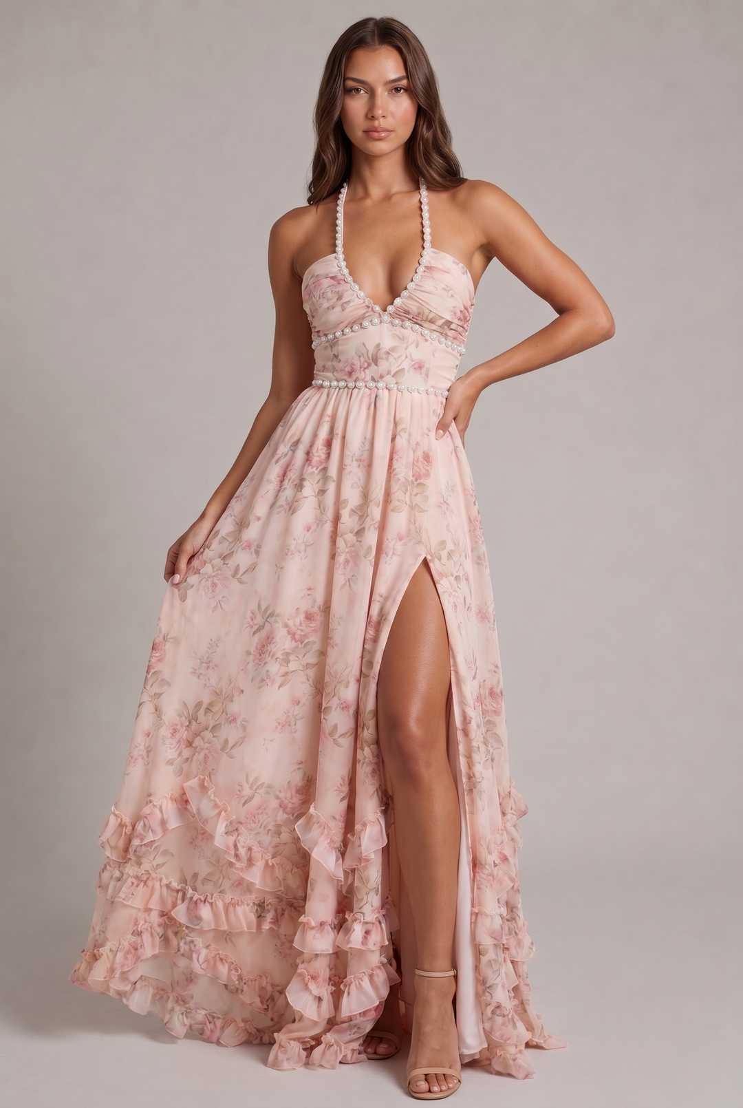 Elegant women's floral maxi dress with a sophisticated halter neck, perfect for summer occasions and parties.