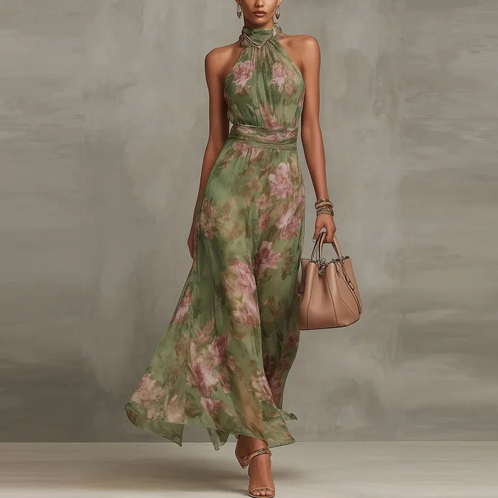 Sleeveless halter neck floral maxi dress for women, featuring a ruched waist, ideal for elegant evening wear.