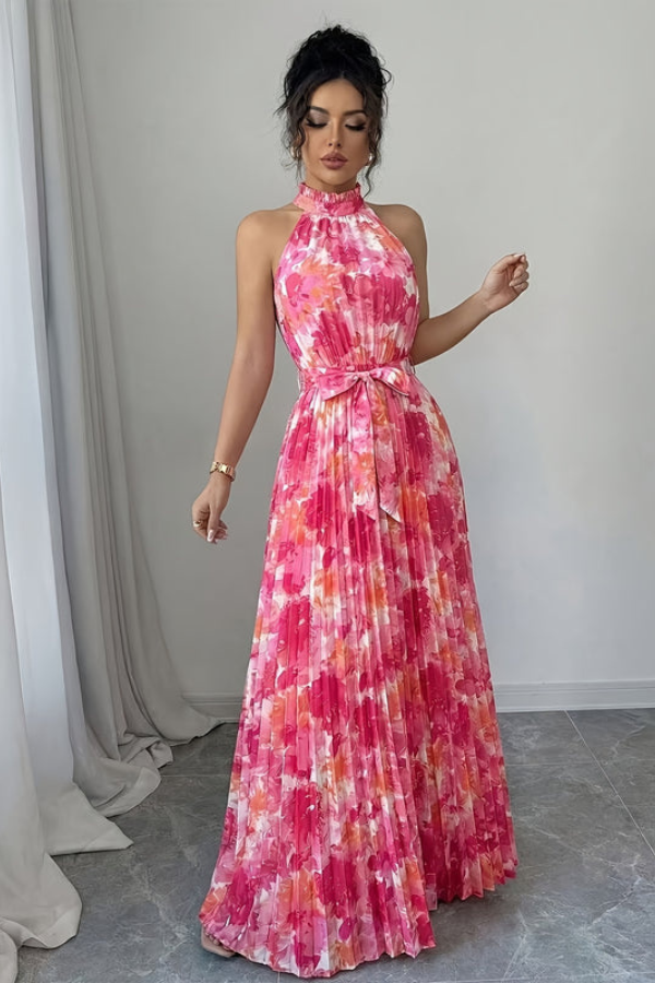 Women's vibrant floral print maxi dress with a flattering halter neckline and playful keyhole design. Ideal for summer.