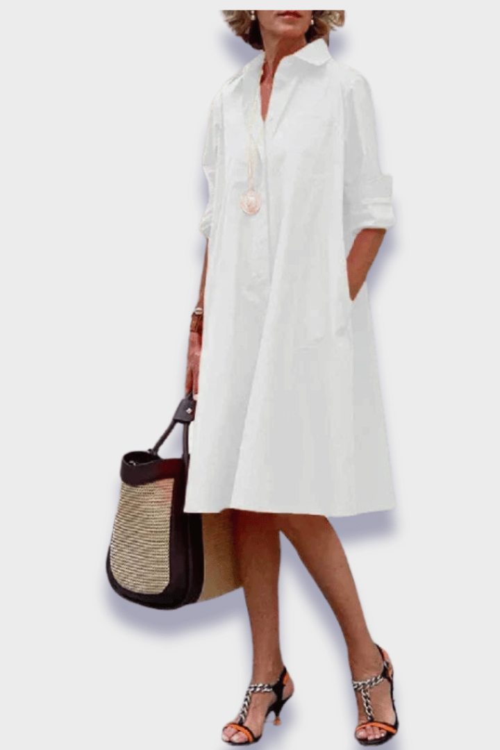 Comfortable women's midi dress with vibrant floral print, an elegant & flattering choice for any occasion.