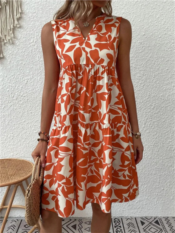 Women's casual floral summer dress with a flowy design, ideal for beach outings or relaxed everyday elegance.