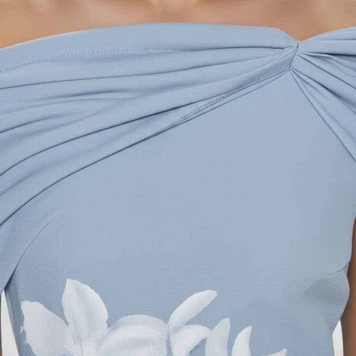 Beautiful women's floral off-shoulder midi dress featuring a draped neckline and elegant fit & flare design.