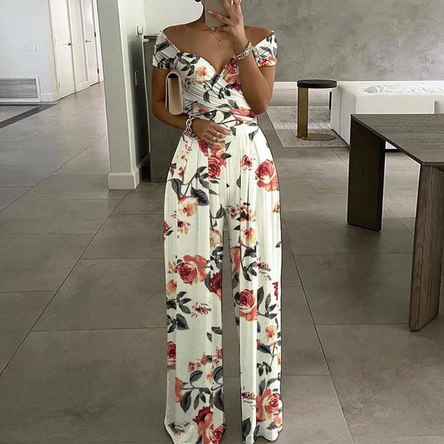 Elegant women's floral off-shoulder wide-leg jumpsuit, perfect for summer vacations.