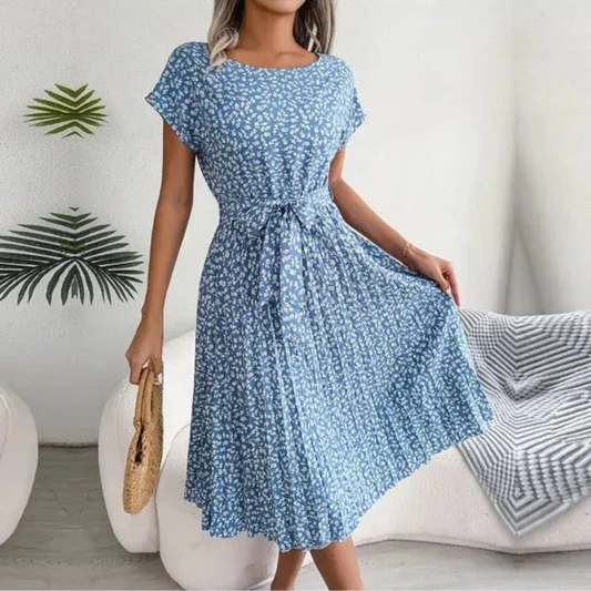 Elegant women's floral pleated midi dress. Perfect for spring, summer, and special occasions.