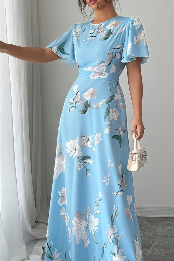 Graceful women's pleated midi dress, floral pattern, retro elegance for day or party wear.
