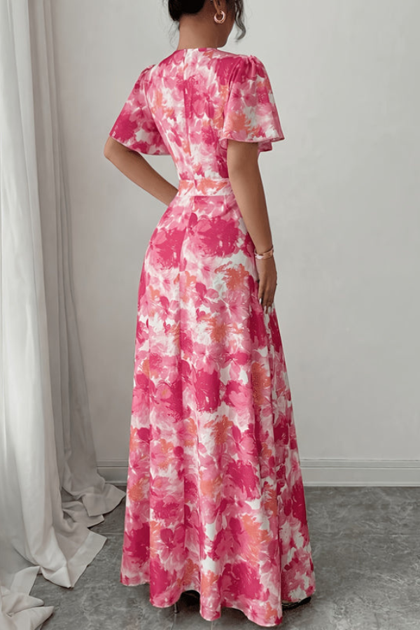 Women's vintage-style floral pleated midi dress, perfect elegant party or day occasion wear.
