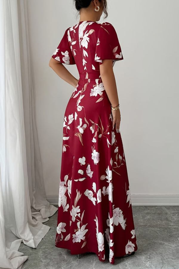 Stylish women's pleated midi dress, floral print, retro design, great for evening parties.