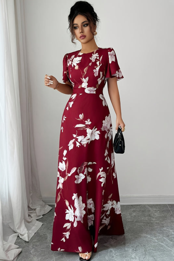 Beautiful women's floral midi dress, elegant retro style with a graceful pleated skirt.