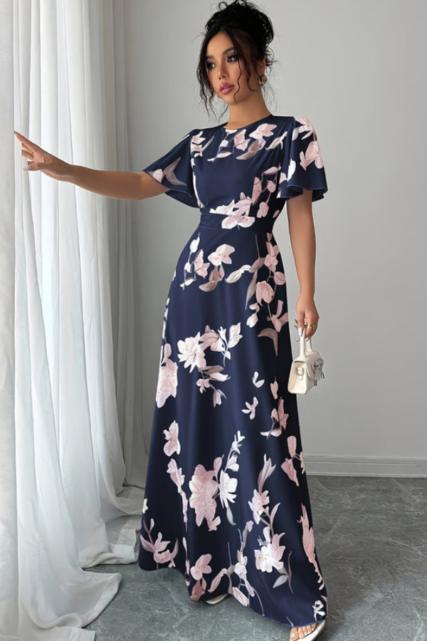 Vacation ready: women's elegant floral pleated midi dress in a chic retro design.