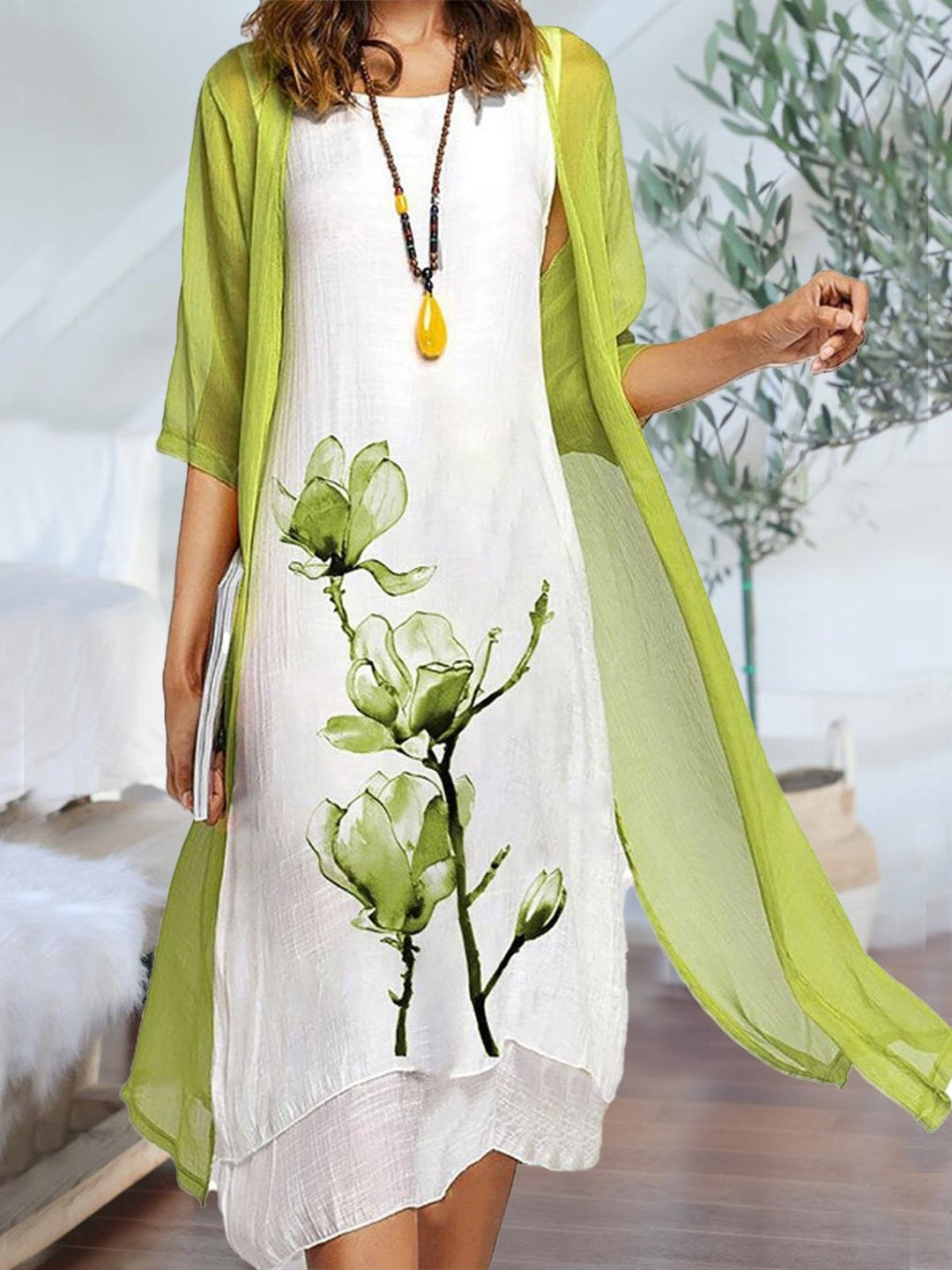 Elegant women's floral print midi dress and matching cardigan set. Perfect for spring/summer layered style & casual wear.