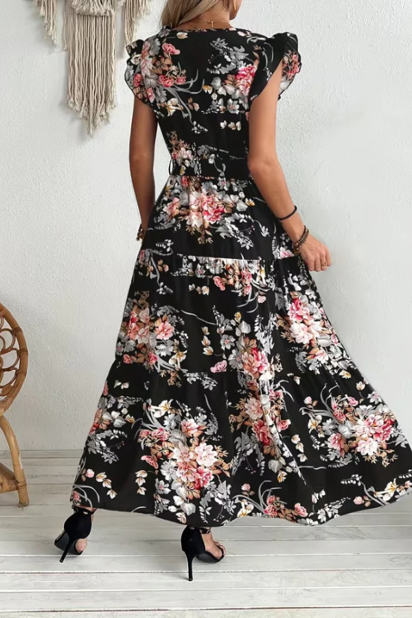 Chic women's floral print swing dress. A comfortable, elegant maxi dress with V-neck & ruffle sleeves for summer.