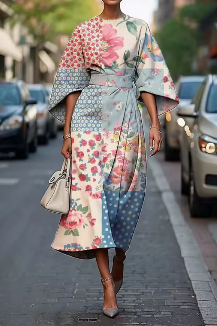 Comfortable women's floral summer dress, ideal for vacations & warm weather events. A feminine and flowy midi style.