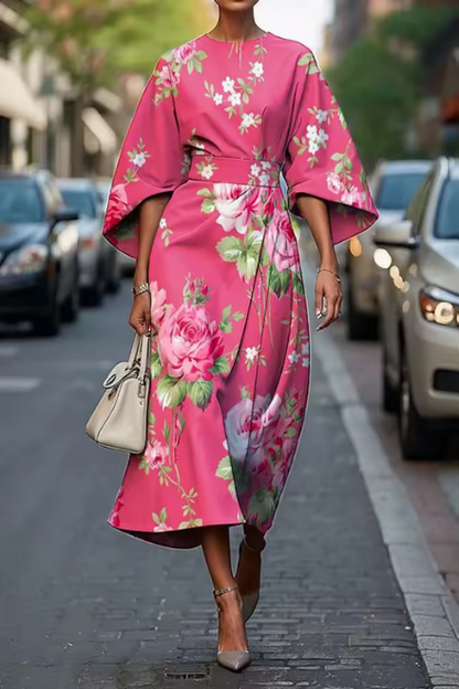 Vibrant floral print women's midi dress, an elegant choice for summer parties & special occasions. Feminine and chic.
