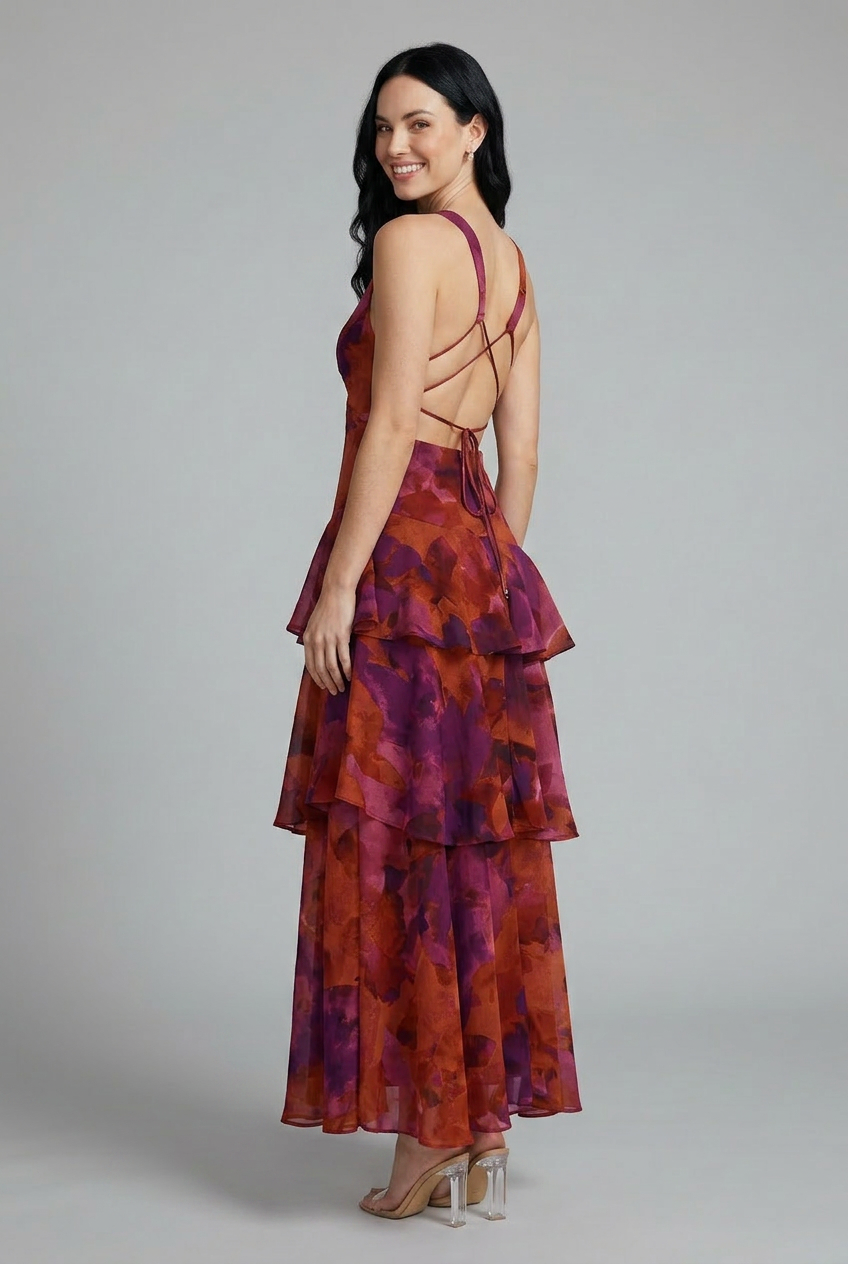 Vibrant women's floral tiered maxi dress, sleeveless V-neck summer style, perfect for casual or elegant wear.