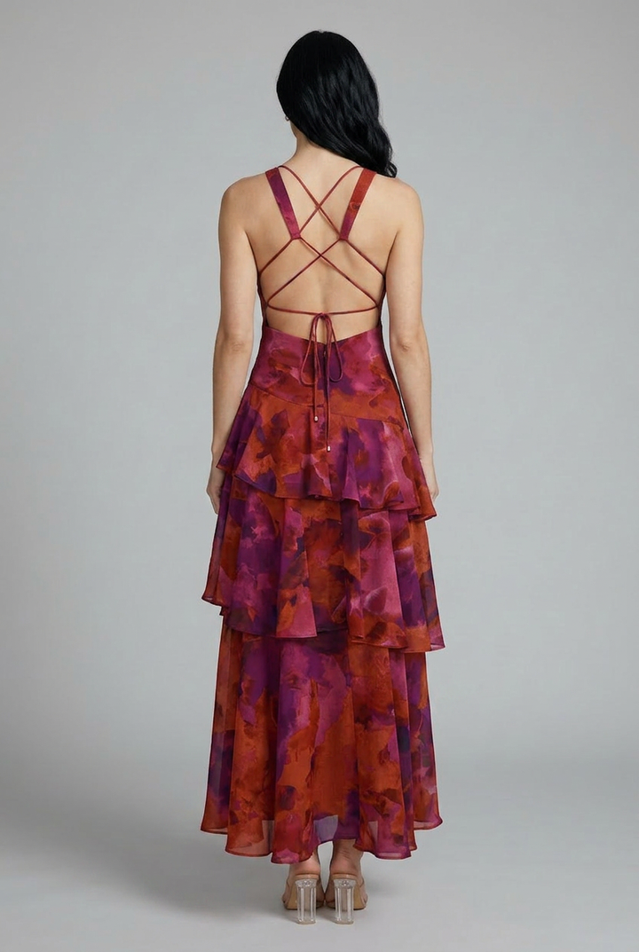 Casual women's floral tiered maxi summer dress, sleeveless V-neck, ideal vacation or beach resort outfit.