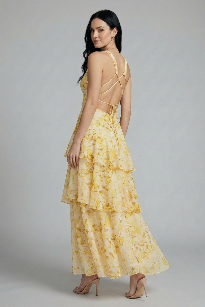 Chic women's floral tiered maxi summer dress, sleeveless V-neck, versatile for elegant or casual occasions.