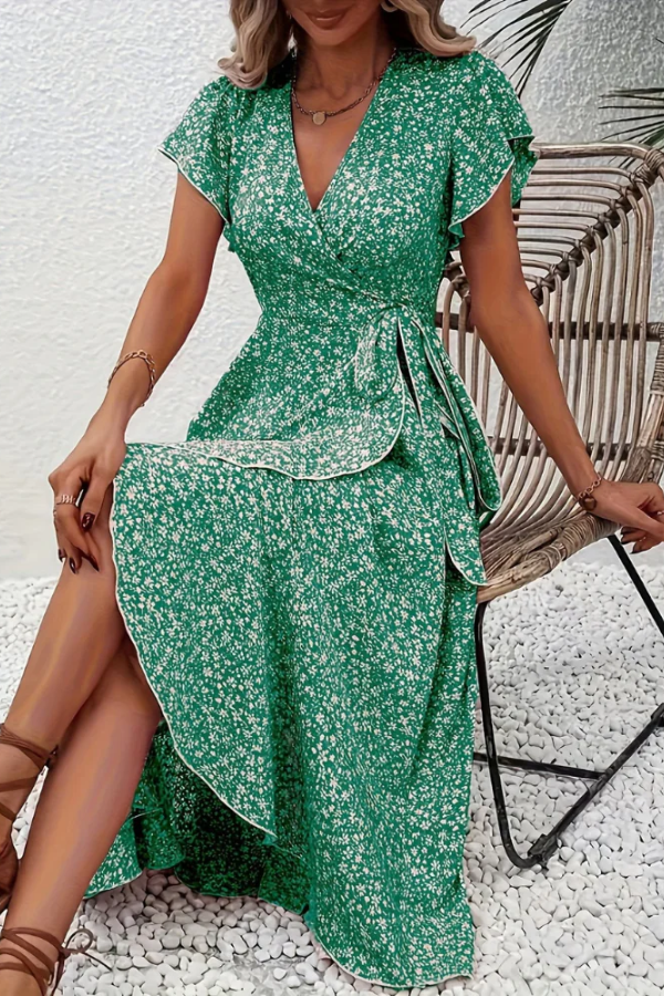 Flattering women's floral V-neck dress, a fitted short sleeve midi with an elegant asymmetrical design.
