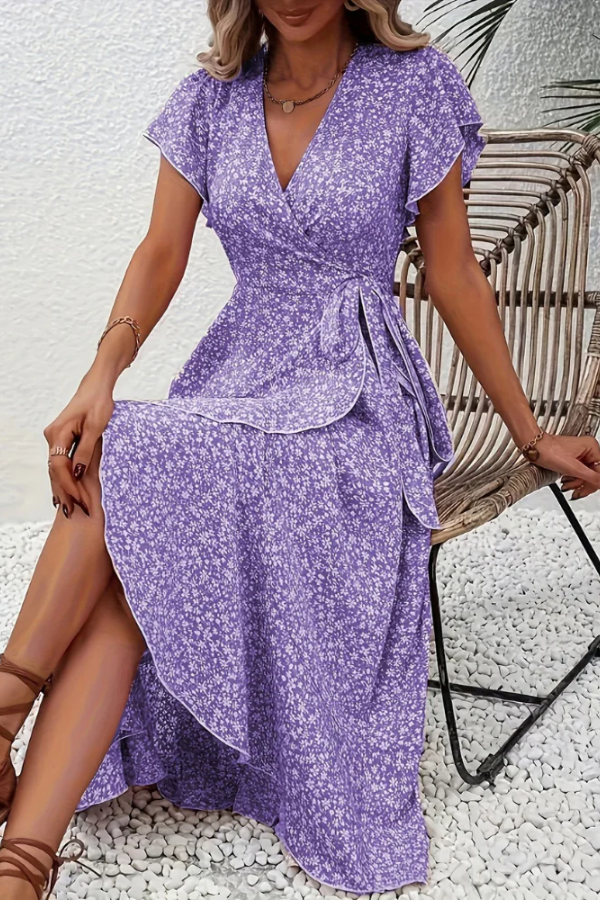 Chic floral V-neck midi dress for women, flattering silhouette with short sleeves & elegant design.
