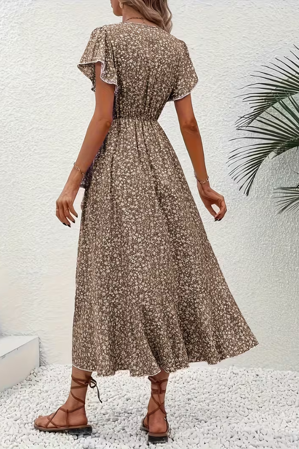 Flattering floral V-neck midi dress for women, featuring a chic asymmetrical hem and short sleeves.