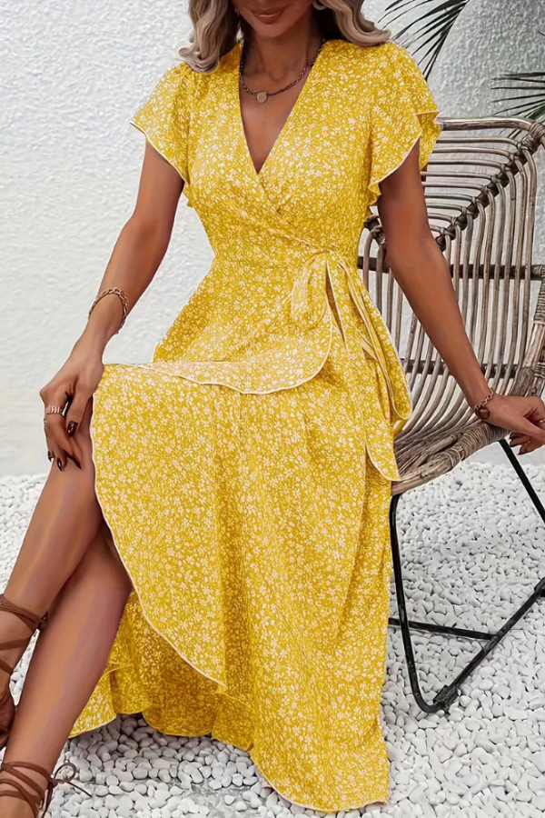 Women's elegant floral V-neck midi dress with short sleeves & an asymmetrical hem for summer fashion.