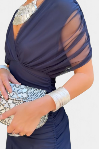 Women's elegant floral V-neck maxi dress, a stylish pleated evening gown.