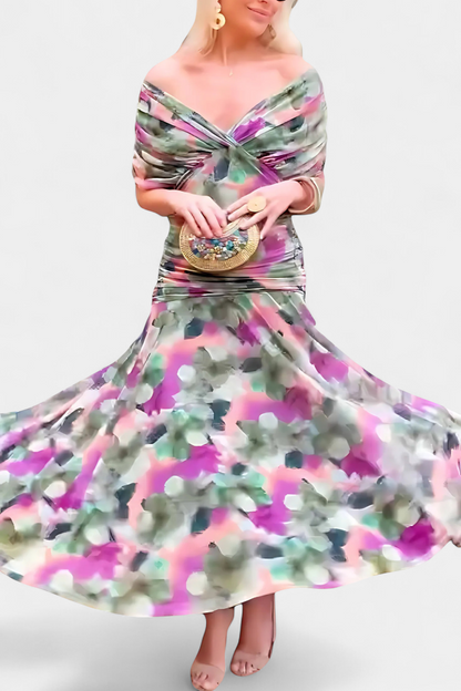 Women's elegant maxi dress: floral print, V-neck, and chic pleated details.