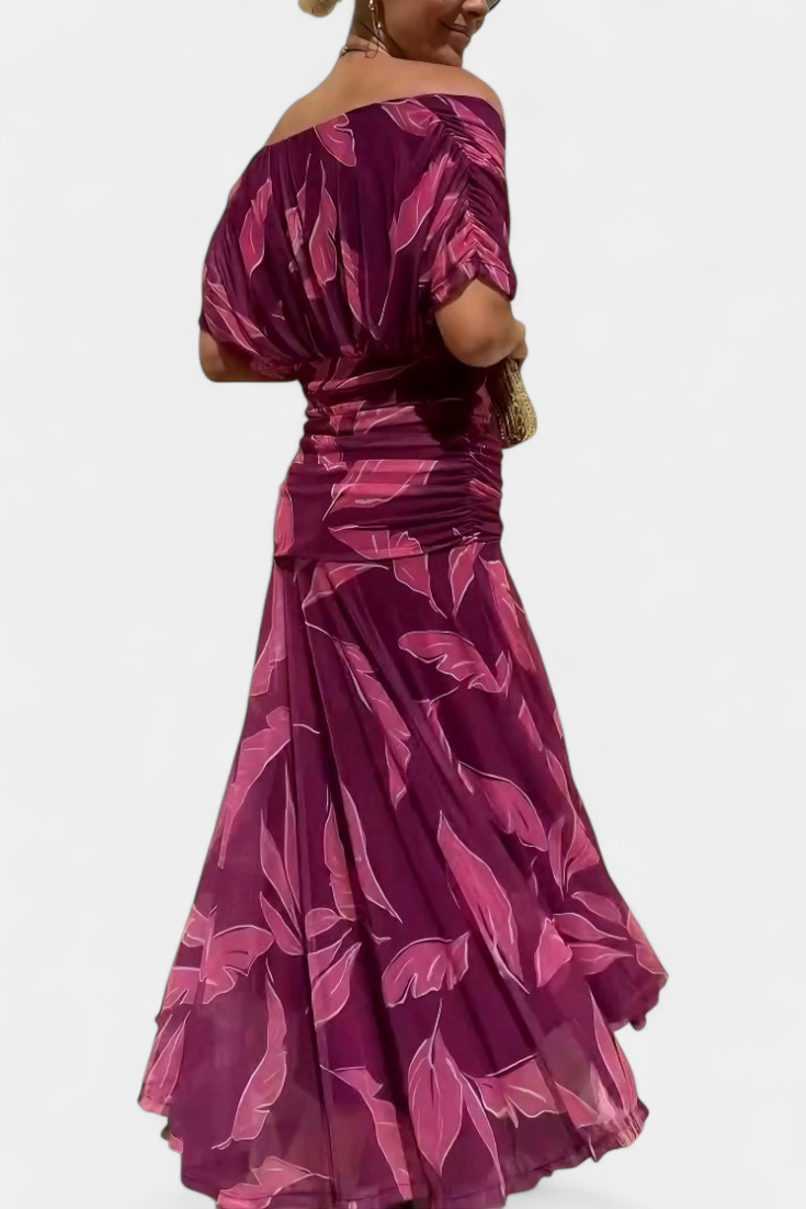 Women's elegant floral pleated maxi dress, a stylish choice for any party.