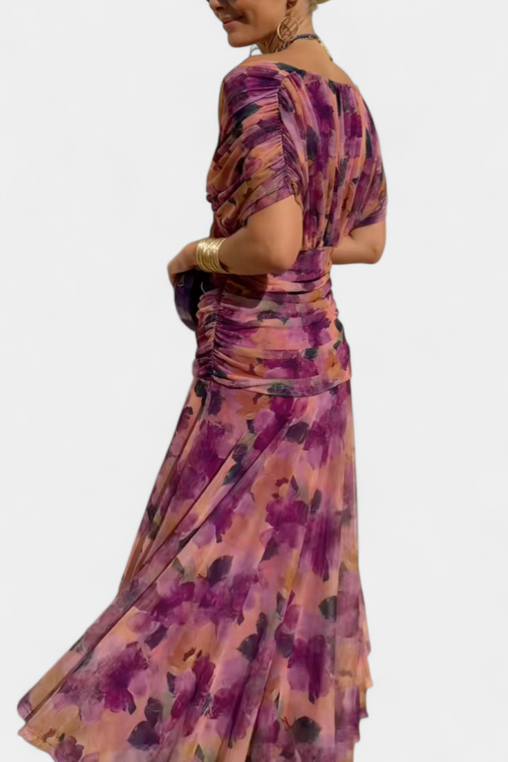 V-neck floral maxi dress with pleated skirt, elegant women's party fashion.