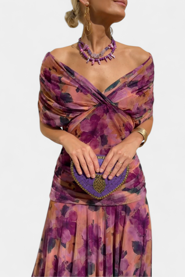 Pleated V-neck maxi dress for women, featuring a stunning floral print.