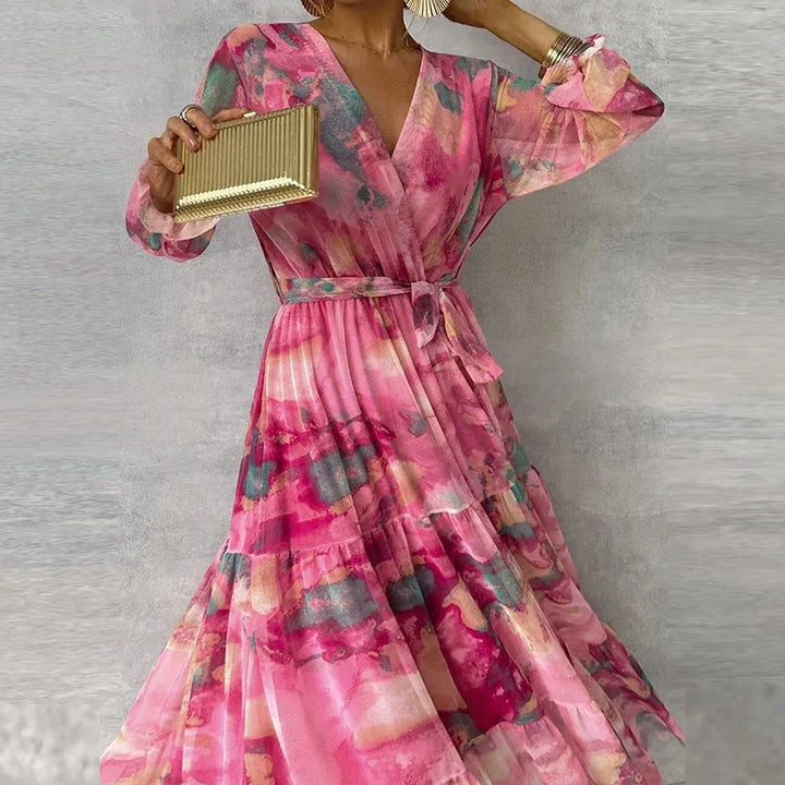 Stunning floral V-neck wrap maxi wedding guest dress for women. Elegant long summer party dress with a flowing silhouette.