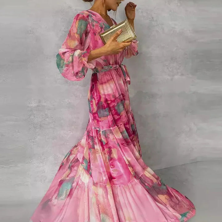 Women's long floral print V-neck wrap maxi dress, suitable as a tiered wedding guest or elegant summer vacation dress.