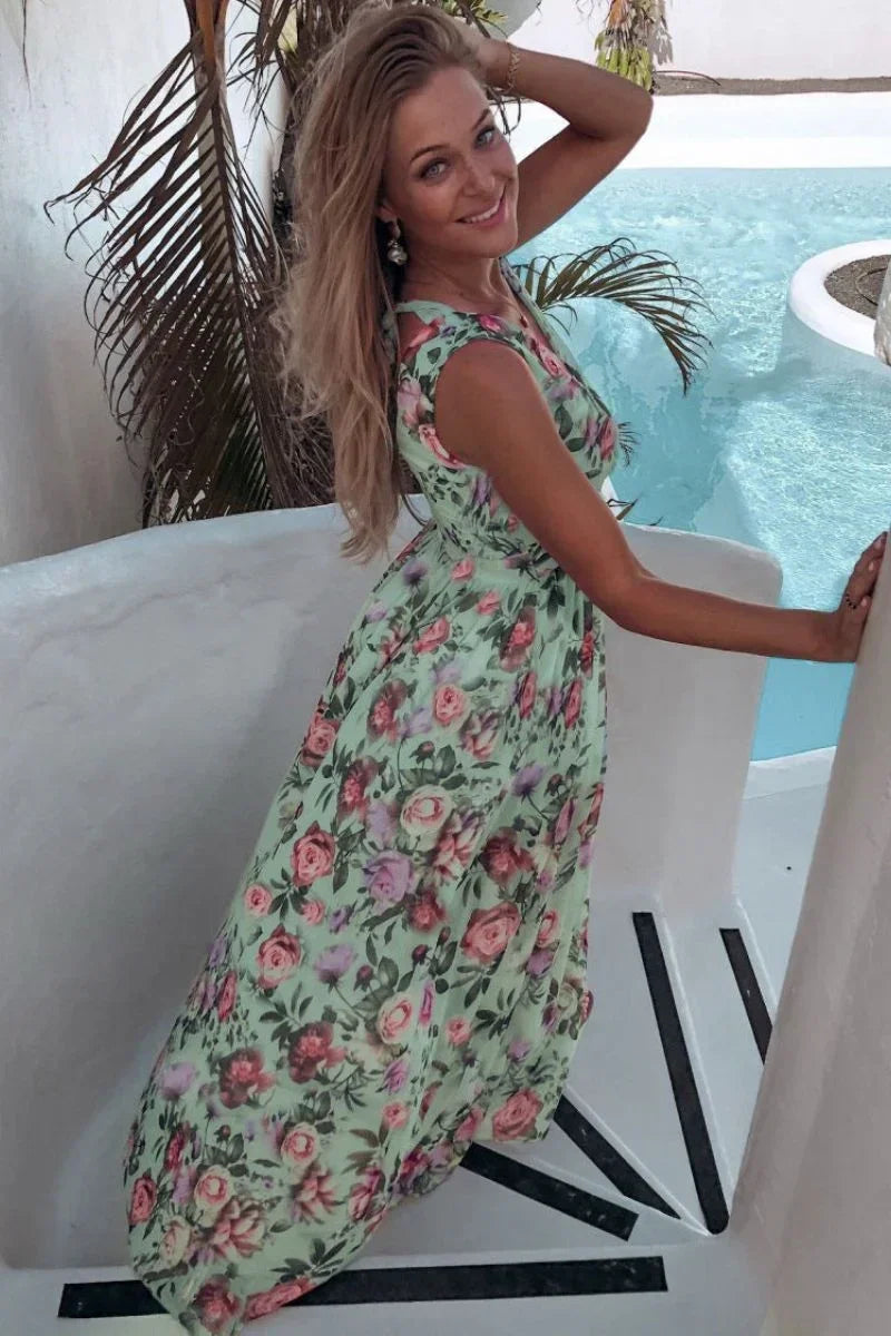 Chic women's summer floral wrap maxi dress, an elegant choice for vacation, beach, or spring party wear.