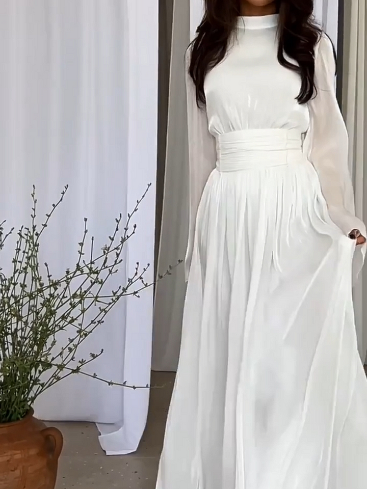 Versatile women's flowing maxi dress, ideal for casual wear, beach, or elegant evening events. Comfortable summer fashion.