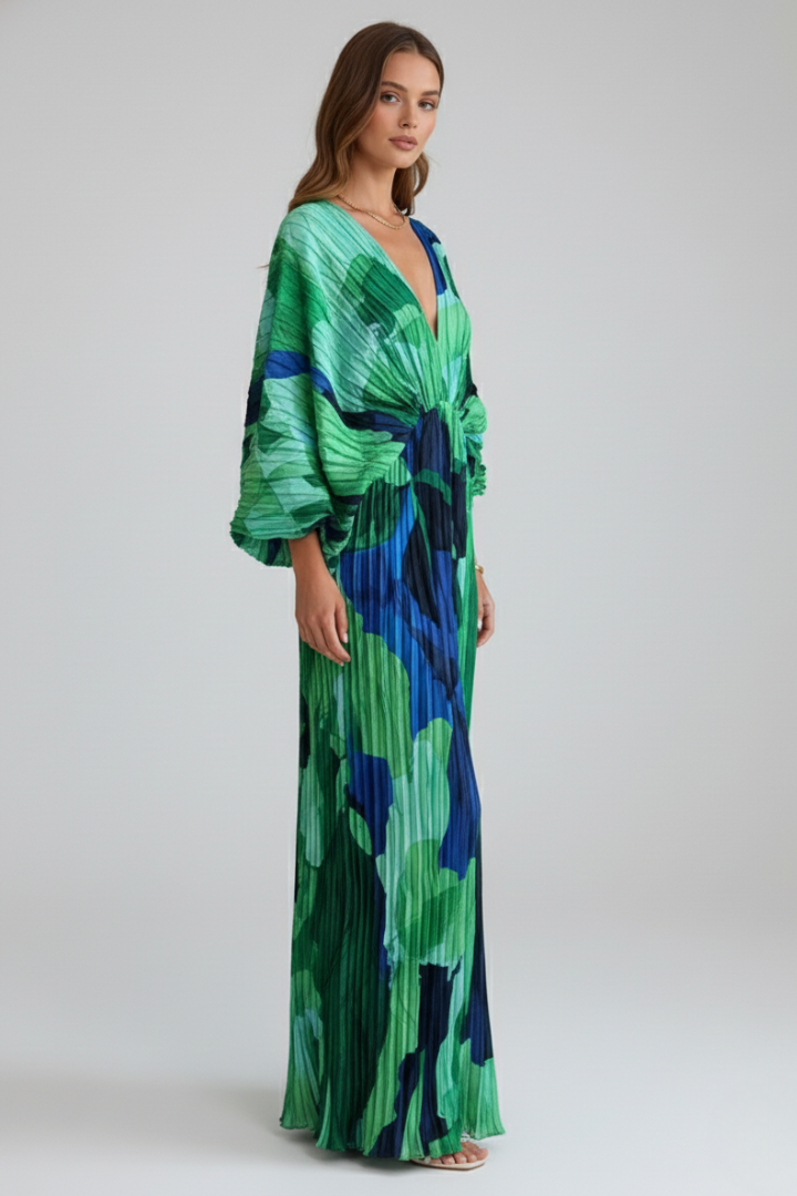 Long pleated green maxi dress for women featuring a flattering V-neck and a fashionable side slit design.