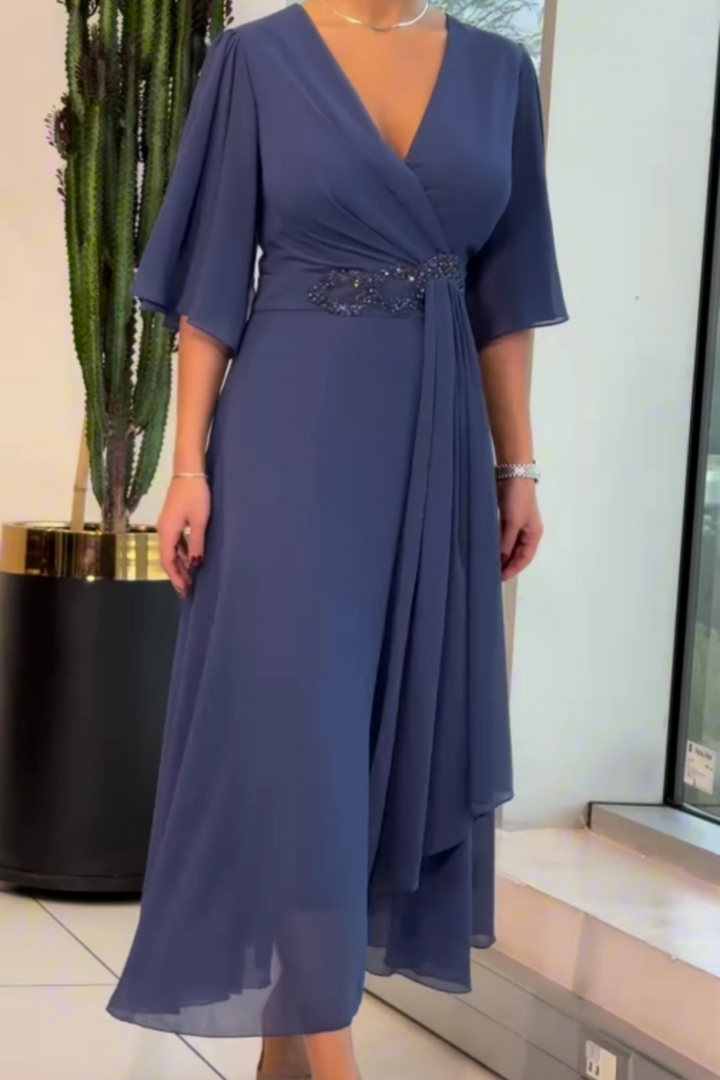 Comfortable grey women's flowing maxi dress with V-neck, ideal for summer casual elegant occasions.