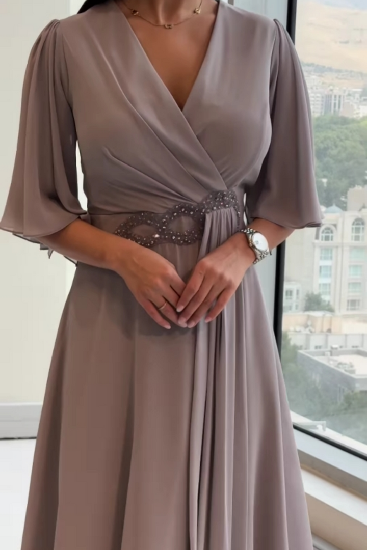 Navy V-neck maxi dress for women, flowing design with adjustable straps, perfect for summer casual outings.