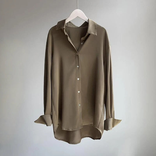 Elegant women's flowy blouse shirt, perfect for effortless style. Versatile and chic long sleeve top.