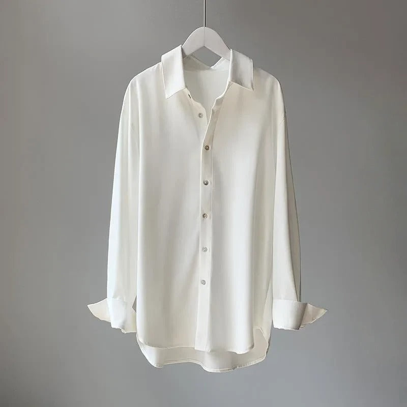 Versatile women's flowy blouse, ideal for office wear or casual outings. Comfortable & stylish long sleeve shirt.