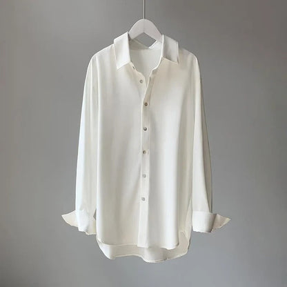 Versatile women's flowy blouse, ideal for office wear or casual outings. Comfortable & stylish long sleeve shirt.