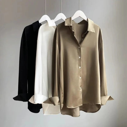 Stylish women's elegant flowy blouse top for versatile fashion. Comfortable long sleeve shirt, great for office.