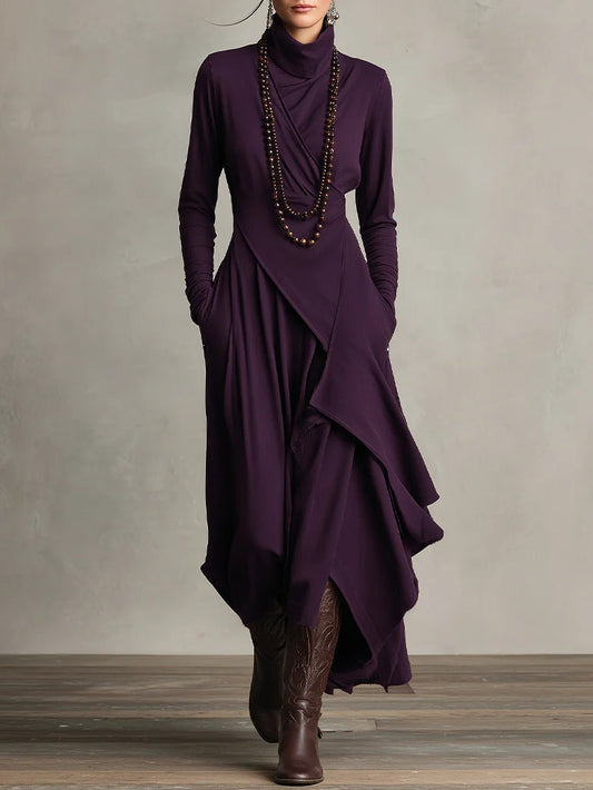Elegant women's flowy draped maxi dress with long sleeves, perfect for sophisticated evening events or parties.