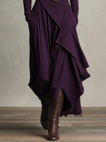 Women's long sleeve maxi dress featuring elegant draping, a flowy silhouette, and sophisticated chic style.