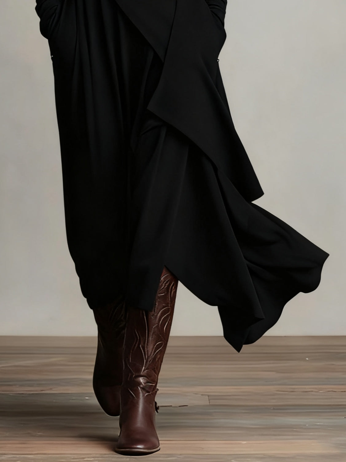 Women's elegant flowy maxi dress, featuring a sophisticated draped design and comfortable long sleeves.