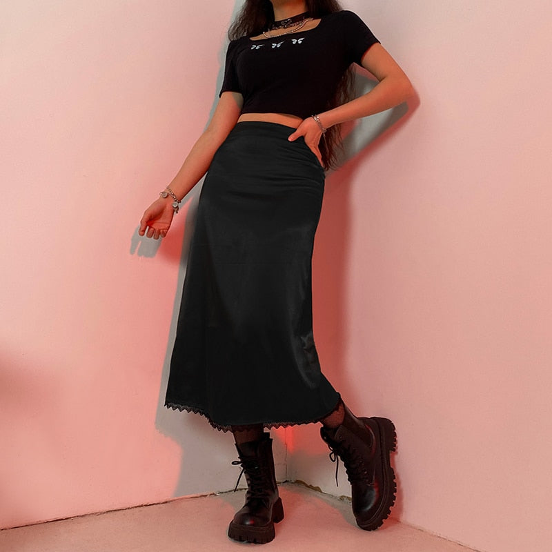 Aesthetic women's flowy long skirt. Elegant, chic, and versatile for modern everyday fashion styles.