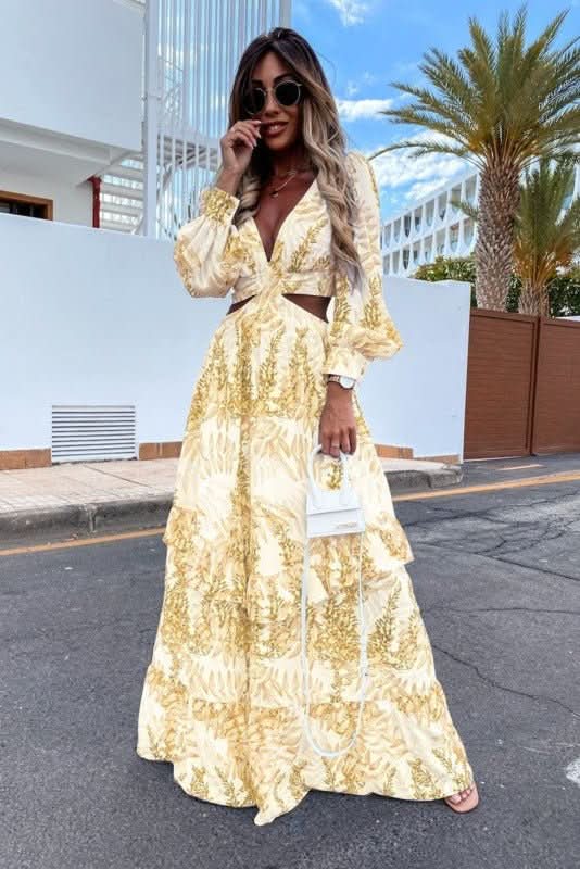 Elegant woman in a long flowy maxi dress walking, showcasing its effortless style & comfortable fit.