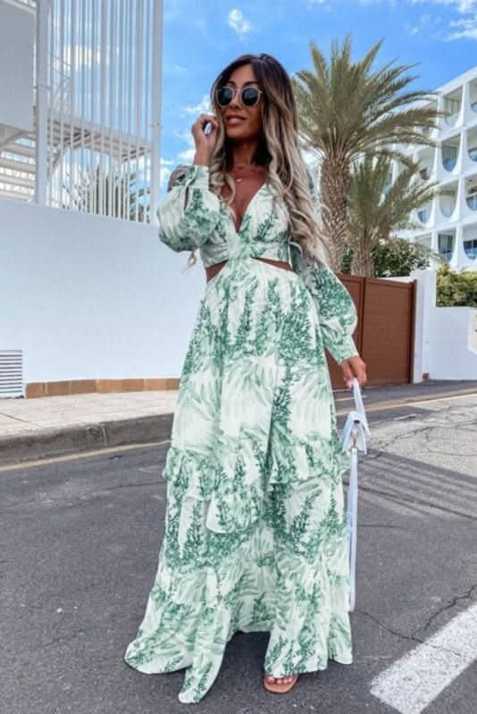 Vibrant colorful women's maxi dress with an elegant flowy design, great for casual or evening events.