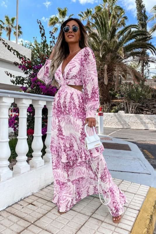 Chic women's flowy maxi dress, versatile for elegant evenings, summer vacations, or everyday style.