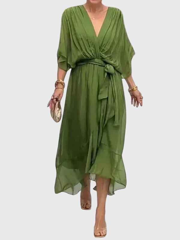 Elegant women's flowy maxi dress with V-neck, perfect for summer parties or formal occasions.