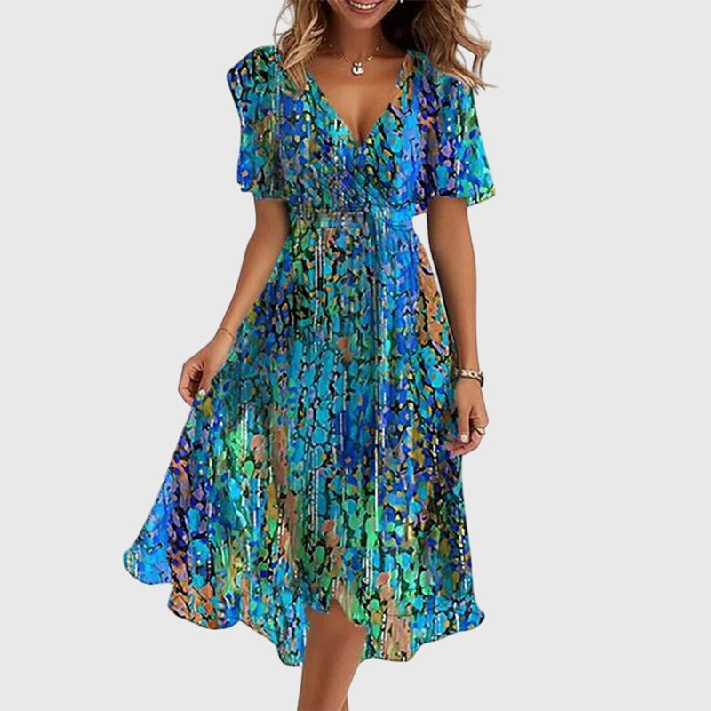 Elegant women's flowy midi dress with V-neck & flutter sleeves, perfect for chic summer style and versatile occasion wear.